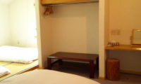 Alpine Central Bedroom with Twin Beds and Study Table | Izumikyo 2