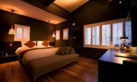 Kimamaya Boutique Hotel Bedroom with Wooden Floor | Middle Hirafu Village