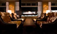 Green Leaf Niseko Village Tomioka White lobby lounge with Fireplace | Niseko Village