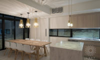 Loft Niseko Kitchen and Dining Area at Night | Middle Hirafu