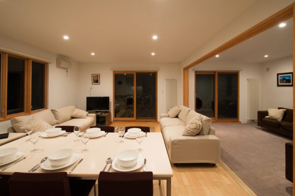 The Chalets at Country Resort Kurodake Living and Dining Area with Wooden Floor | West Hirafu