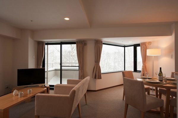 One Niseko Resort Towers Dining Area with TV | Moiwa