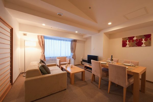 One Niseko Resort Towers Living and Dining Area with TV | Moiwa