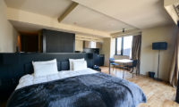 Muse Niseko Spacious Bedroom with Dining Area | Middle Hirafu