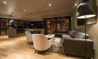 Aspect Niseko Living and Dining Area at Night | Middle Hirafu Village