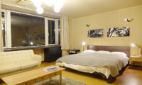 Ebina Chalet and Lodge Bedroom with Seating Area | Moiwa
