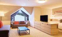 Sheraton Kiroro Hokkaido Resort Bedroom with Sofa and TV | Kiroro