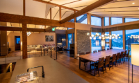 Panorama Niseko Indoor Living and Dining Area with Wooden Floor | East Hirafu