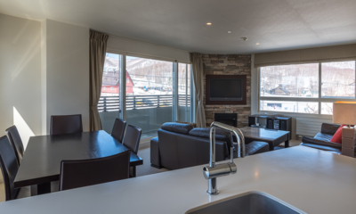 The Freshwater One Bedroom Apartment Living and Dining Area with TV | Middle Hirafu