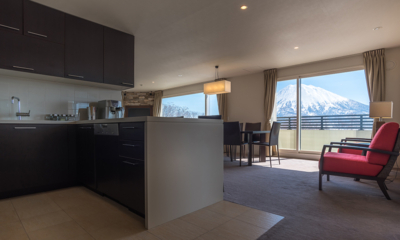 The Freshwater Two Bedroom Apartment Penthouse Panorama Kitchen and Dining Area | Middle Hirafu