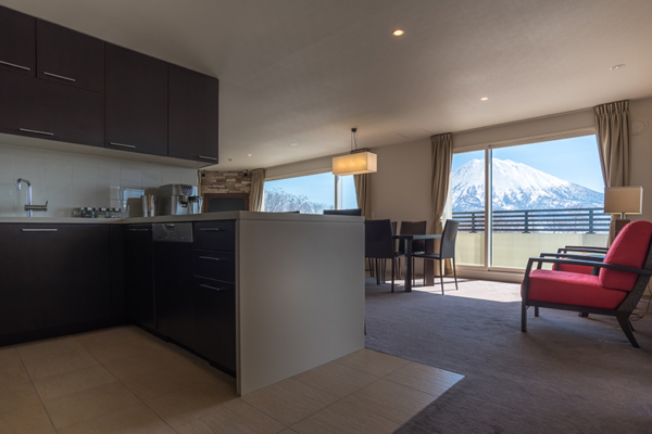 The Freshwater Two Bedroom Apartment Penthouse Panorama Kitchen and Dining Area | Middle Hirafu