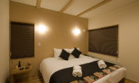 Chalet Mi Yabi Bedroom with Wooden Floor | Lower Hirafu