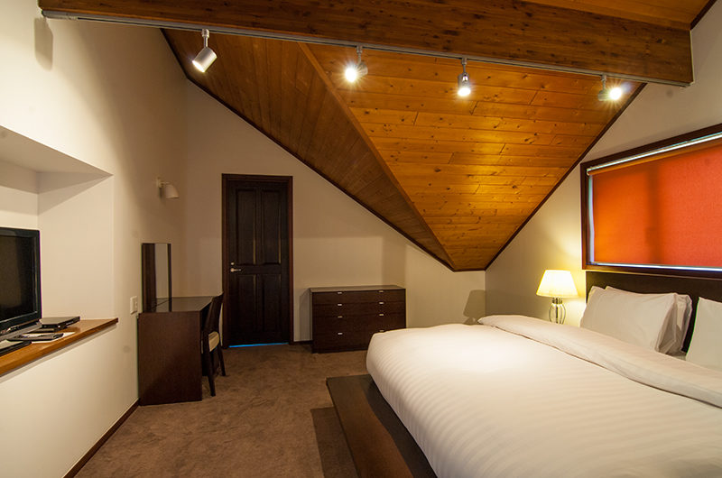 Casa La Mont Bedroom with Carpet and TV | Annupuri