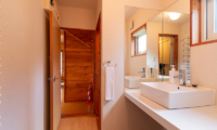 Powder Cottage His and Hers Bathroom with Mirror | Middle Hirafu Village