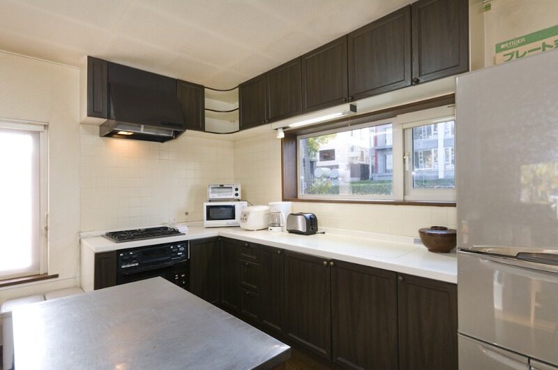 Powderhound Lodge Kitchen Area with Wooden Floor | Upper Hirafu