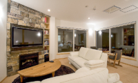 Birch Grove Living Area with TV and Fireplace | Lower Hirafu