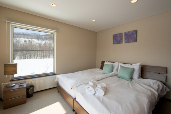 The Chalets at Country Resort Nosappu Bedroom with Outdoor View | West Hirafu