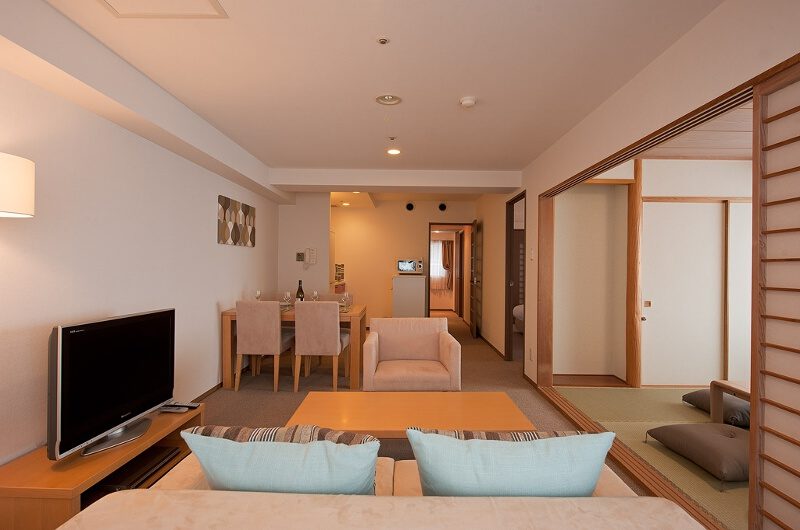One Niseko Resort Towers Living and Dining Area with Carpet | Moiwa