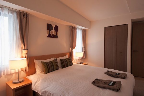 One Niseko Resort Towers Bedroom with Table Lamps | Moiwa