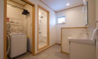 Ruby Chalet Bathroom with Laundry Area | East Hirafu