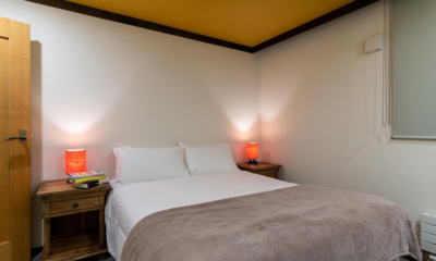 Gustav's Hideaway Bedroom with Side Lamps | Lower Hirafu