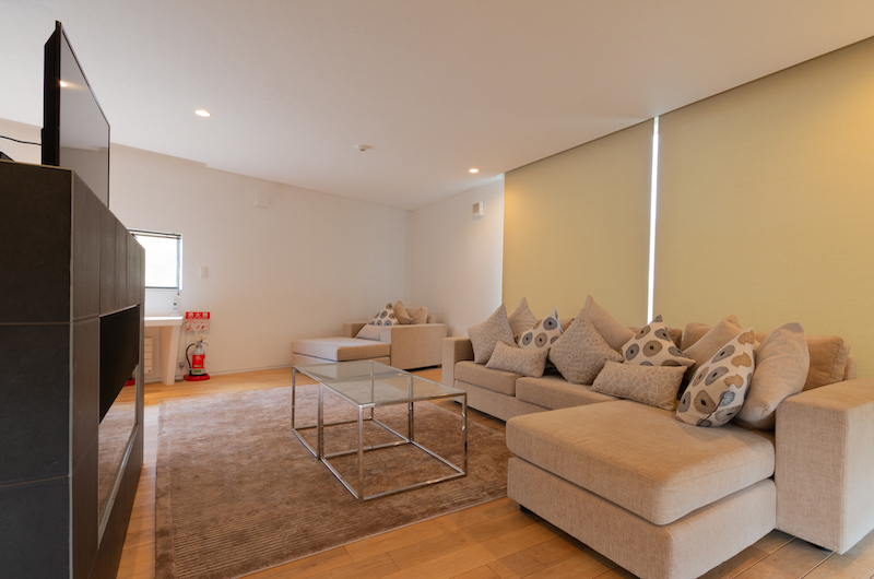 Kawasemi Residence Lounge Area with TV | Lower Hirafu