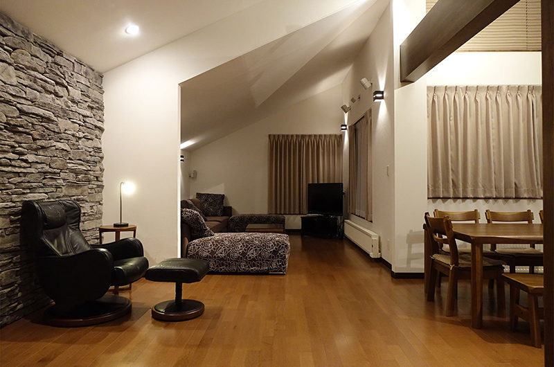 Shungyo Living and Dining Area at Night | East Hirafu