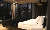 Matthew Suites Bedroom with TV at Night | Middle Hirafu