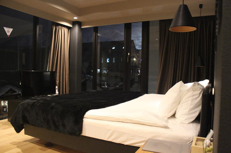 Matthew Suites Bedroom with TV at Night | Middle Hirafu