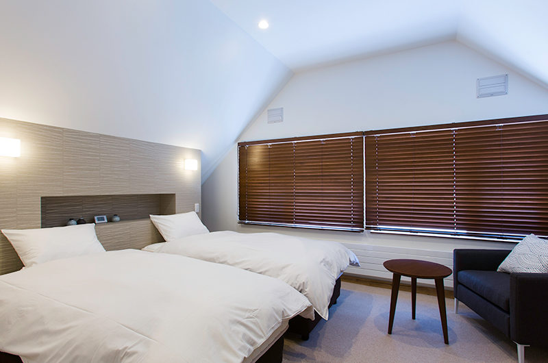 Gresystone Twin Bedroom with Sofa | Lower Hirafu