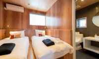 Heiwa Lodge Twin Bedroom and Bathroom | West Hirafu