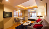 M Hotel Suite Living Area with TV | Middle Hirafu