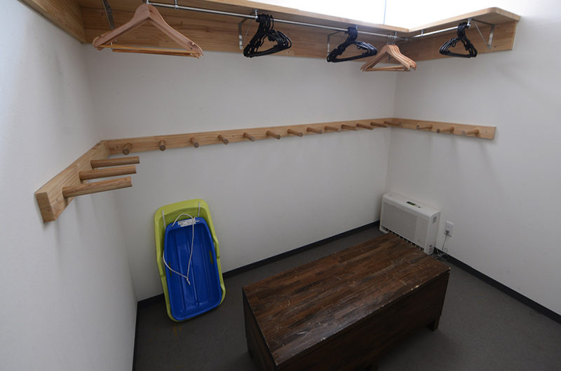 Toshokan Townhouses Drying Room with Seating Area | Middle Hirafu
