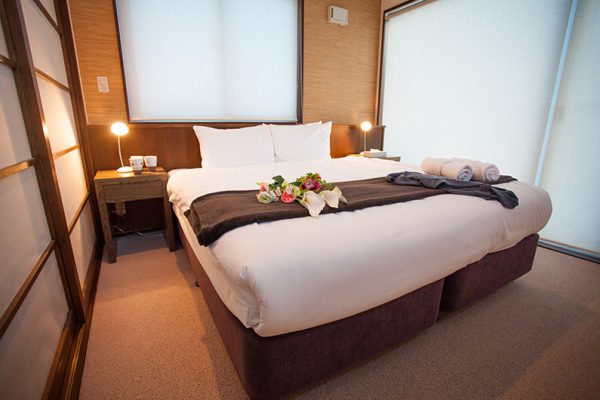 Toshokan Townhouses Bedroom with Table Lamp | Middle Hirafu
