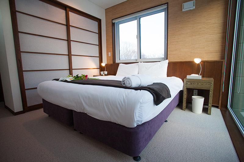 Toshokan Townhouses Bedroom with Carpet | Middle Hirafu