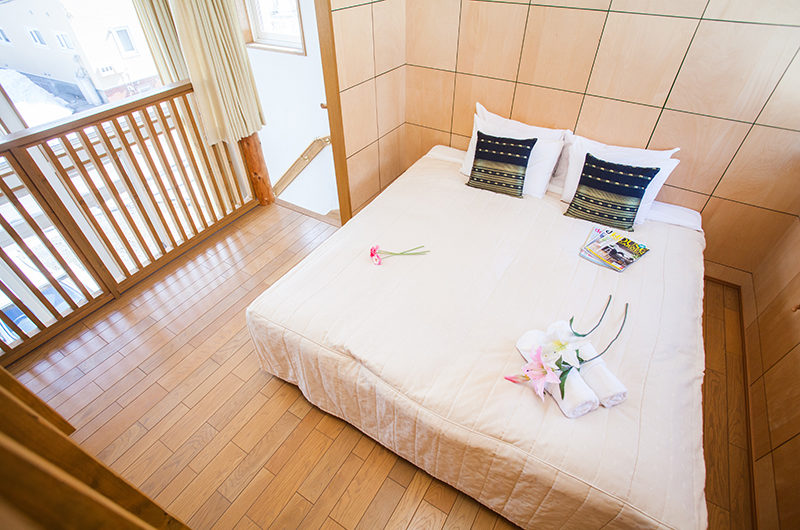 Yotei Cottage Bedroom with Wooden Floor | Lower Hirafu