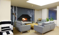 Ebina Chalet and Lodge Lounge Area near Fireplace | Moiwa