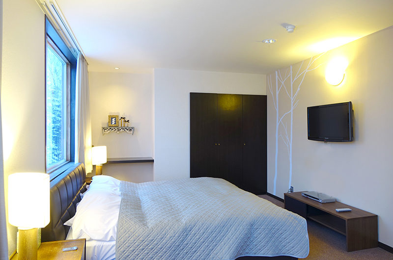 Ebina Chalet and Lodge Bedroom with TV | Moiwa