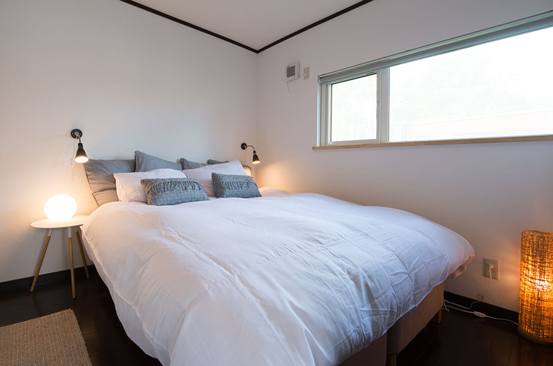 Kuma Cabin Bedroom with Wooden Floor | Lower Hirafu