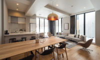 The Kamui Niseko Living Kitchen and Dining Area with Wooden Floor | Annupuri