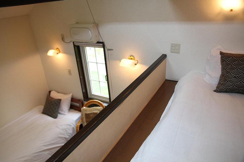 Popcorn Lodge Bedroom with Triple Beds | East Hirafu