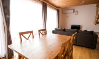 Bliss Cottage Sakura Living and Dining Area with TV | East Hirafu