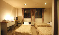 Aria Hotel Bedroom with Three Beds | Lower Wadano