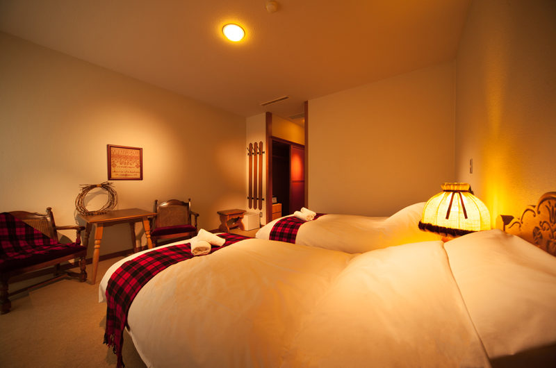 Marillen Hotel Twin Bedroom with Seating Area | Happo Village