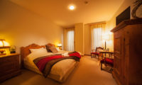 Marillen Hotel Bedroom at Night | Happo Village