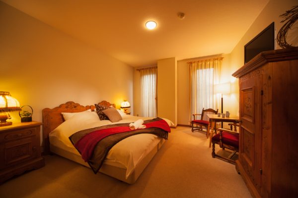 Marillen Hotel Bedroom at Night | Happo Village