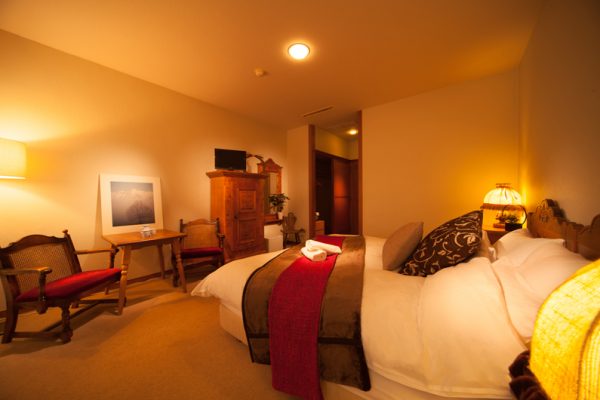 Marillen Hotel Bedroom with Seating Area | Happo Village