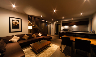 Phoenix Chalets Living and Dining Area at Night | Lower Wadano