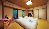 Phoenix Hotel Bedroom with Seating Area | Lower Wadano