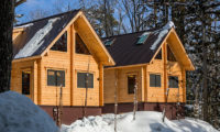 Wadano Woods Chalets Exterior with Snow and Trees | Lower Wadano
